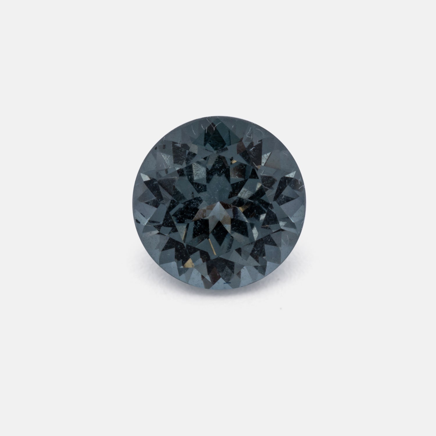 Spinell - grau, rund, 5.5x5.5 mm, 0.77 cts, Nr. SP90147